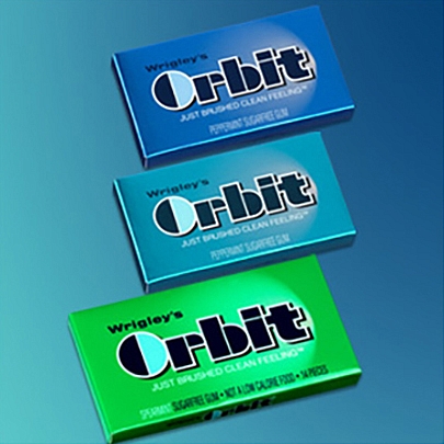Three different colored packages of Orbit® gum.